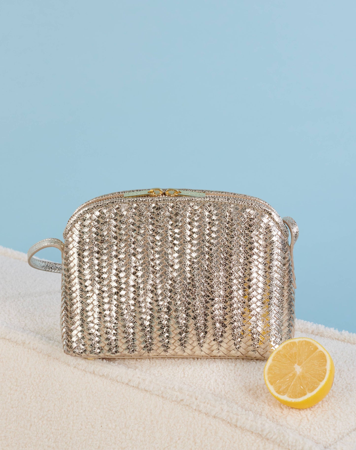SAC DEMI-LUNE CUIR TRESSÉ DORÉ MIA